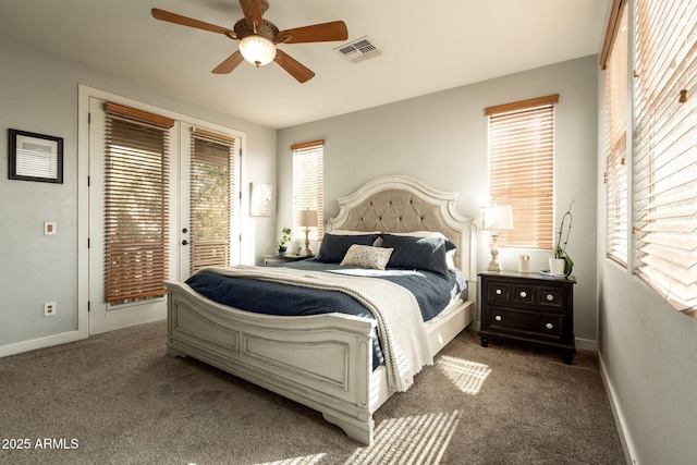 bedroom featuring access to exterior, visible vents, baseboards, carpet flooring, and a ceiling fan