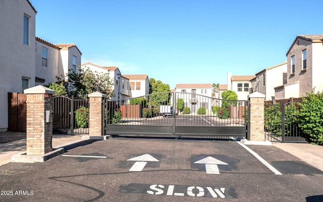 view of gate featuring a residential view