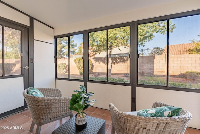 sunroom featuring a wealth of natural light