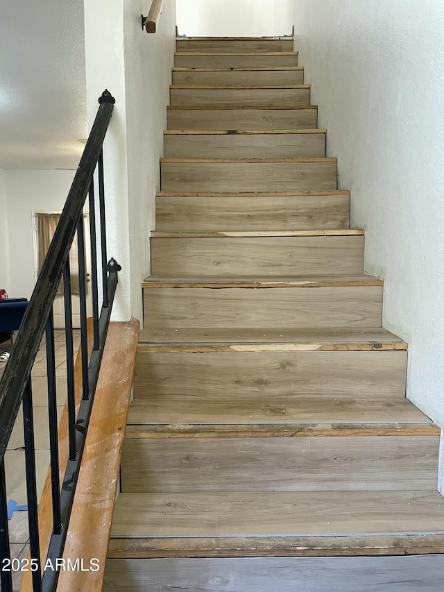 3324 W Mcrae Way Unit 2, Phoenix, AZ 85027 - stairs with a textured wall