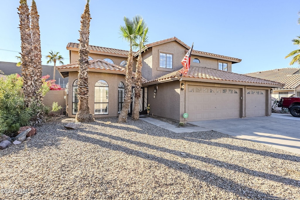 view of front of home with a garage