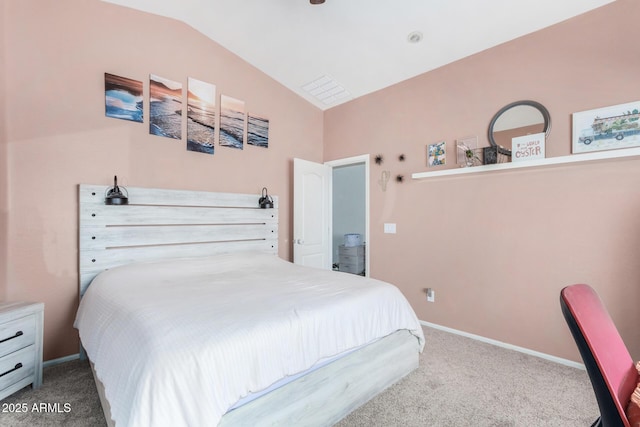 bedroom featuring vaulted ceiling, carpet, and baseboards