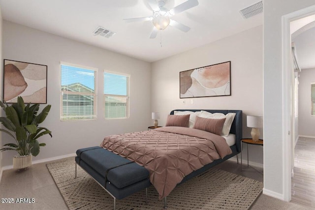 bedroom with light colored carpet and ceiling fan