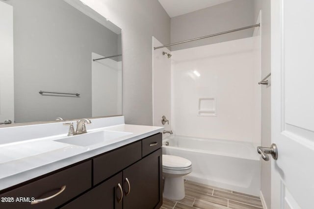 full bathroom featuring vanity, toilet, and bathing tub / shower combination