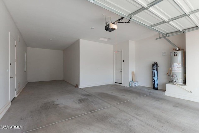 garage featuring a garage door opener and water heater