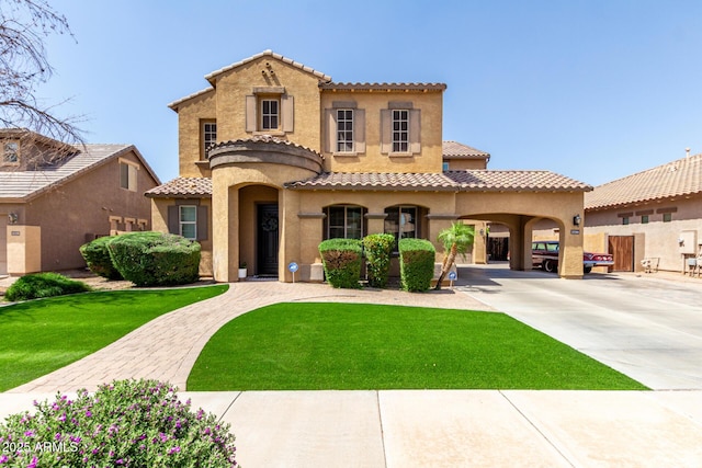 20366 E Via De Colina, Queen Creek, AZ 85142 - mediterranean / spanish house with stucco siding, a tile roof, concrete driveway, and a front lawn