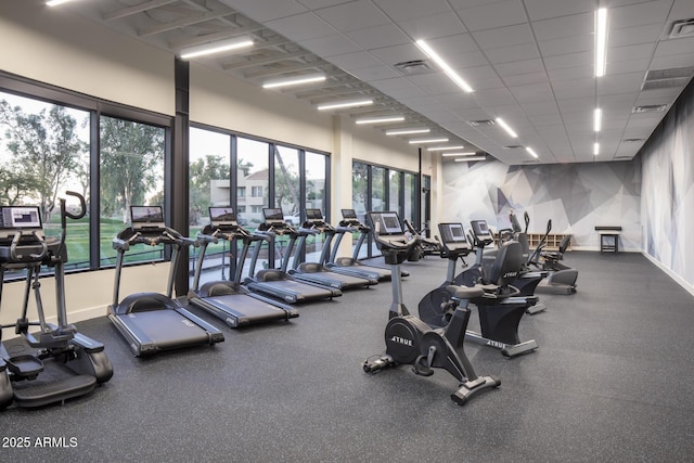 gym featuring a drop ceiling