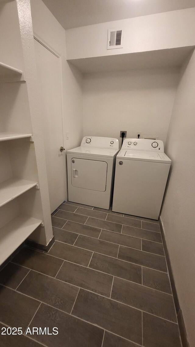 4704 E Paradise Village Pkwy N Unit 211, Phoenix, AZ 85032 - laundry area featuring separate washer and dryer