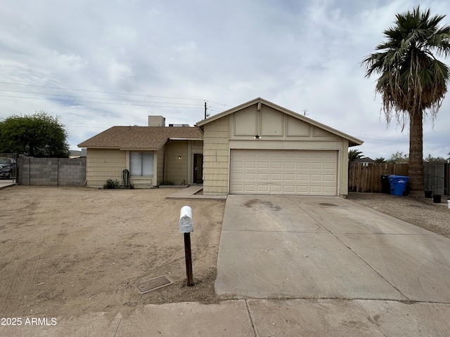 6842 S 42nd Pl, Phoenix, AZ 85042 - ranch-style home with driveway and a garage