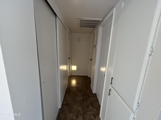 6842 S 42nd Pl, Phoenix, AZ 85042 - hall with dark tile patterned flooring