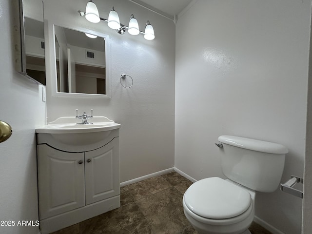 6842 S 42nd Pl, Phoenix, AZ 85042 - bathroom with toilet, vanity, and baseboards