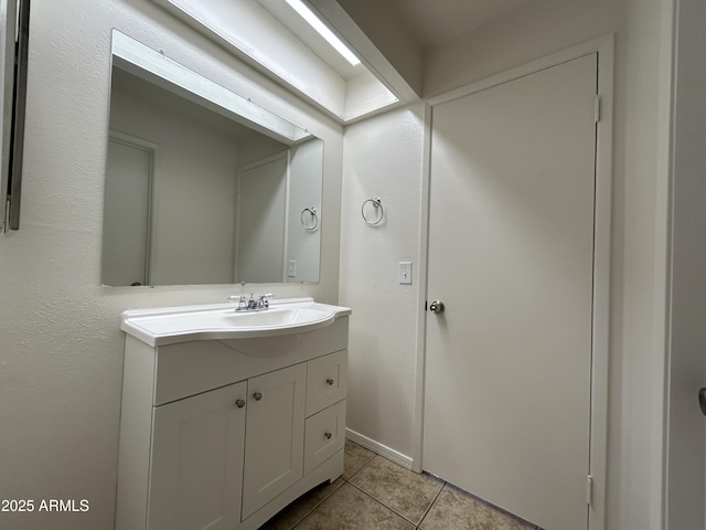 6842 S 42nd Pl, Phoenix, AZ 85042 - bathroom with vanity and tile patterned flooring