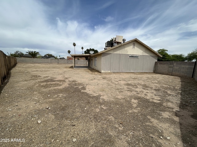 6842 S 42nd Pl, Phoenix, AZ 85042 - rear view of house with a fenced backyard