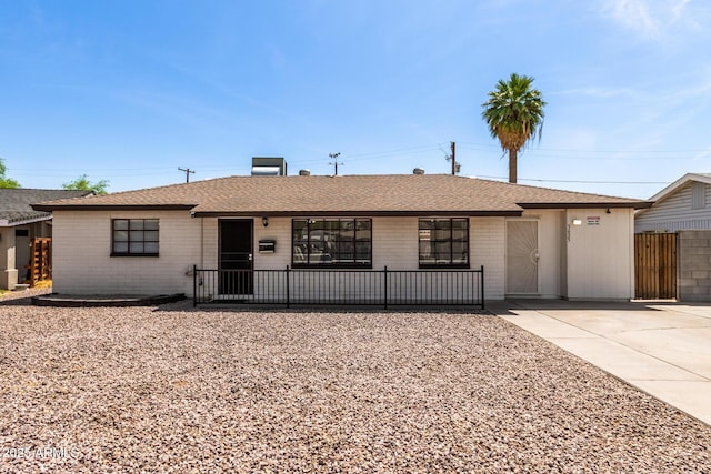 5635 N 35th Dr, Phoenix, AZ 85019 - single story home with brick siding, a shingled roof, and driveway