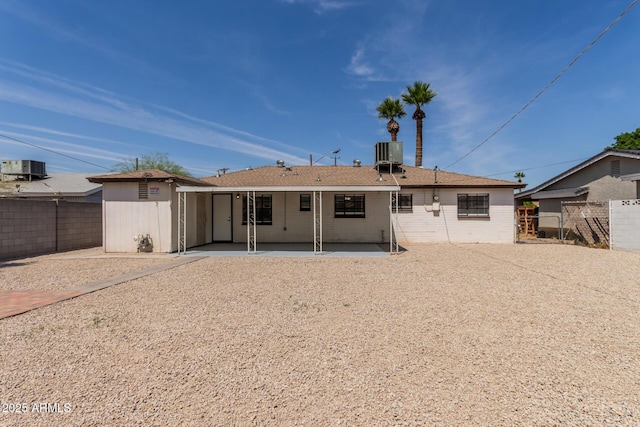 5635 N 35th Dr, Phoenix, AZ 85019 - rear view of house with a patio area and central AC unit