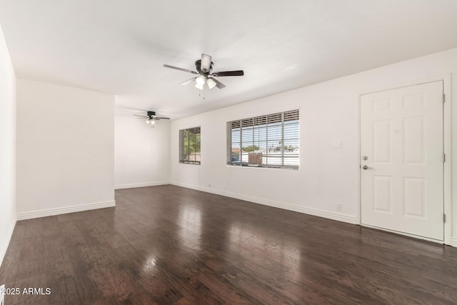 5635 N 35th Dr, Phoenix, AZ 85019 - spare room featuring ceiling fan, dark wood finished floors, and baseboards
