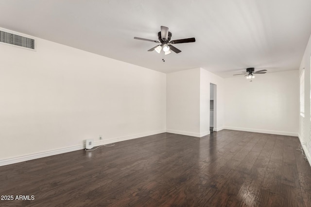 5635 N 35th Dr, Phoenix, AZ 85019 - unfurnished room featuring a ceiling fan, dark wood-style flooring, and baseboards