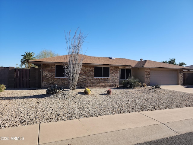 ranch-style house featuring a garage