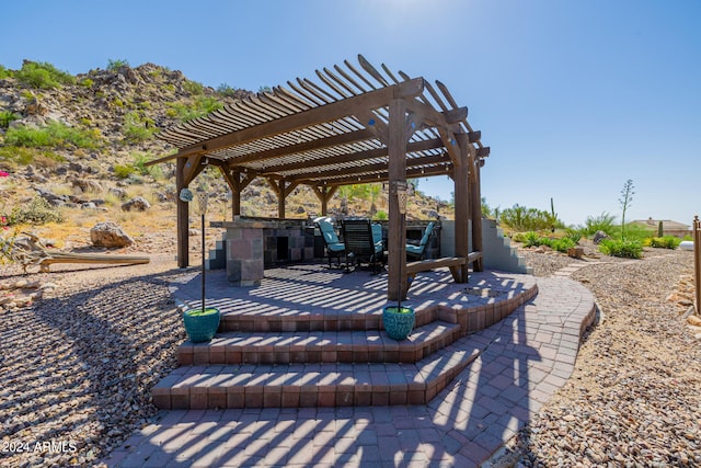 view of patio / terrace featuring a pergola