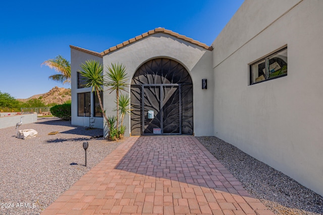 entrance to property with a mountain view