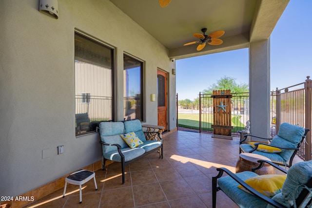 view of patio featuring ceiling fan