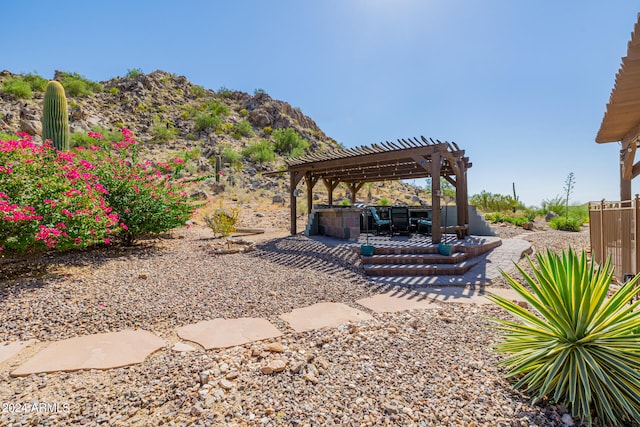 view of yard with a patio and a pergola