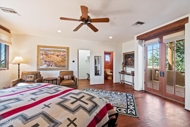 bedroom with connected bathroom, dark hardwood / wood-style flooring, access to outside, ceiling fan, and french doors