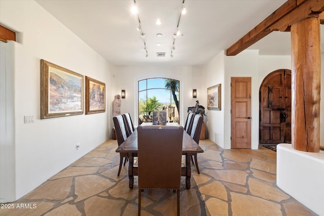 dining space with rail lighting