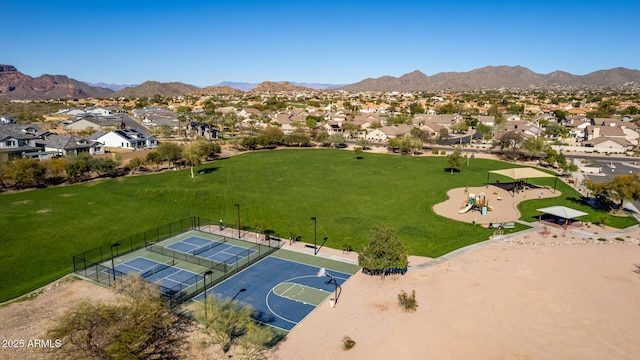 birds eye view of property featuring a mountain view and a residential view