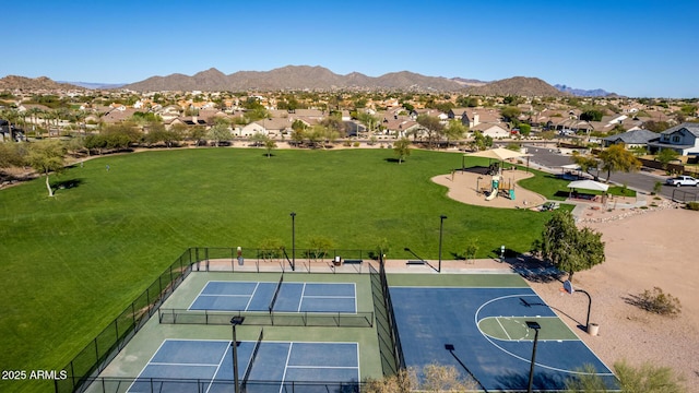 drone / aerial view featuring a mountain view and a residential view