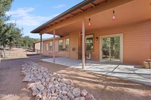 back of house with a patio area