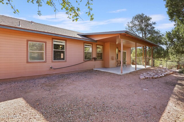 back of house featuring a patio area