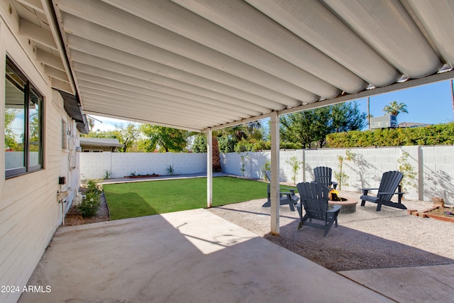 view of patio / terrace featuring a fire pit