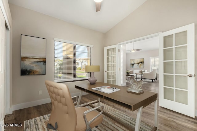 office with wood finished floors, french doors, baseboards, ceiling fan, and vaulted ceiling