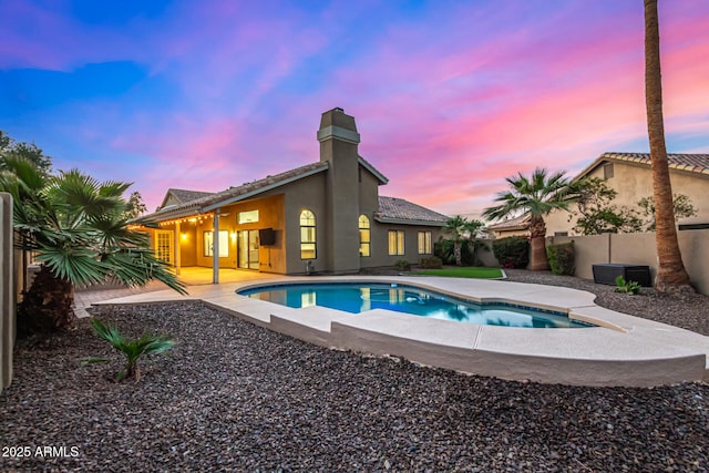 view of pool with a fenced in pool, a patio, and a fenced backyard