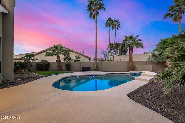 view of swimming pool with a patio area, a fenced backyard, and a fenced in pool