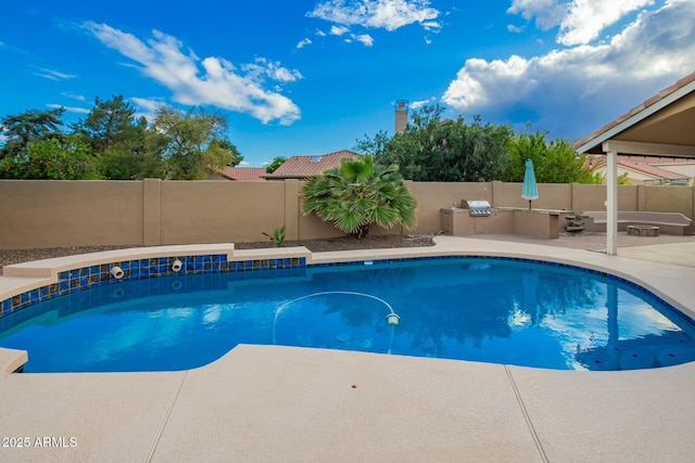 view of swimming pool featuring a fenced in pool, a patio, area for grilling, and a fenced backyard