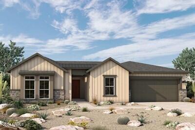 view of front facade featuring board and batten siding, stone siding, and an attached garage