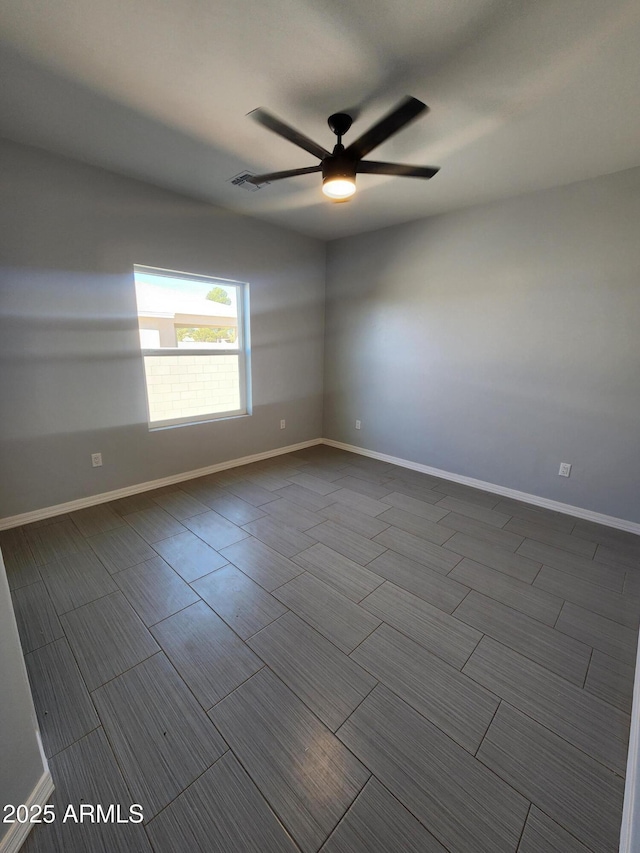 spare room featuring ceiling fan