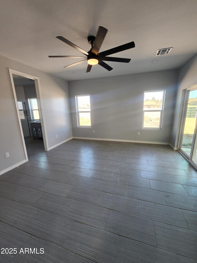 unfurnished room featuring ceiling fan