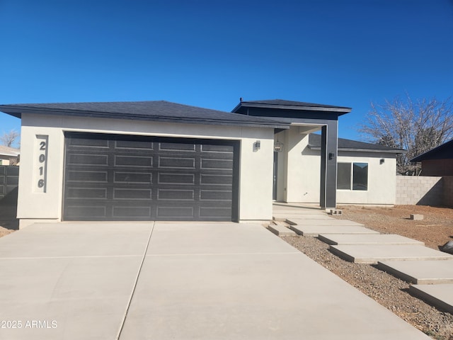 prairie-style home with a garage