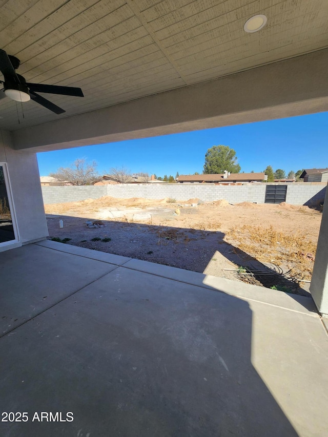 view of patio featuring ceiling fan