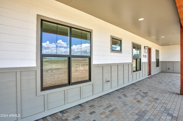 unfurnished sunroom with a healthy amount of sunlight