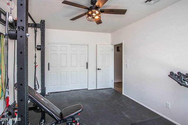 workout room featuring ceiling fan