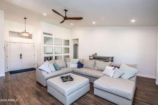 living room with high vaulted ceiling, dark hardwood / wood-style floors, and ceiling fan