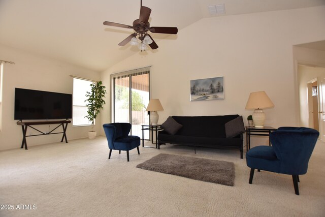 living room featuring carpet flooring, a ceiling fan, visible vents, and high vaulted ceiling