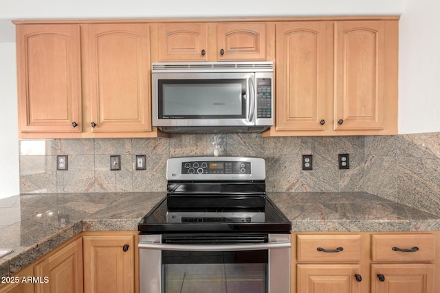 kitchen with backsplash, appliances with stainless steel finishes, light brown cabinets, and tile countertops