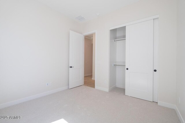 1254 E Penedes Dr, Gilbert, AZ 85298 - unfurnished bedroom featuring carpet floors, a closet, and baseboards