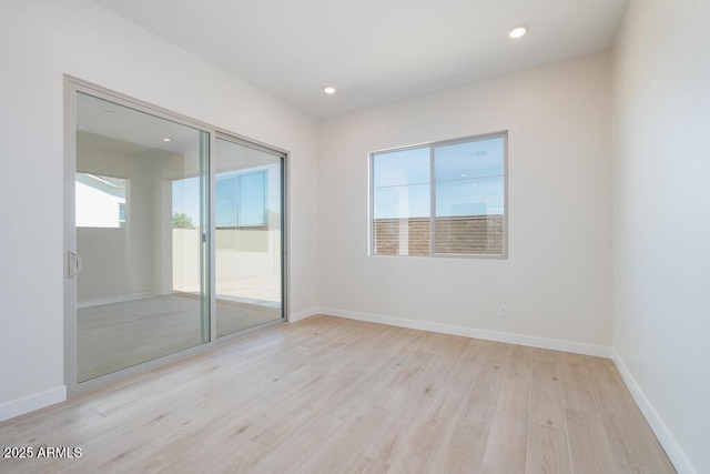 1254 E Penedes Dr, Gilbert, AZ 85298 - empty room with light wood-style floors, recessed lighting, and baseboards