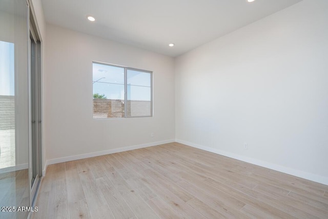 1254 E Penedes Dr, Gilbert, AZ 85298 - empty room with light wood-style flooring, baseboards, and recessed lighting